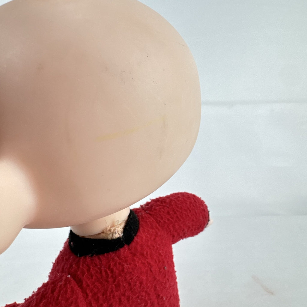 Disney Incredibles Jack-Jack plush doll with vinyl head and rooted hair in a red superhero suit
