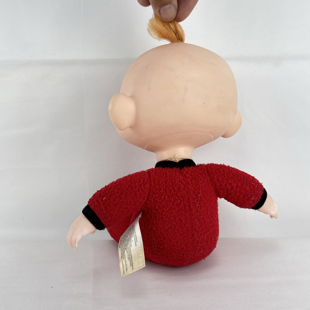Disney Incredibles Jack-Jack plush doll with vinyl head and rooted hair in a red superhero suit