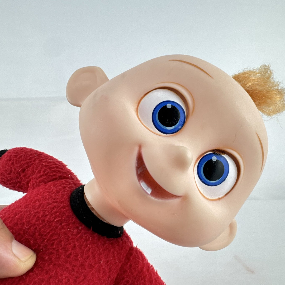 Disney Incredibles Jack-Jack plush doll with vinyl head and rooted hair in a red superhero suit