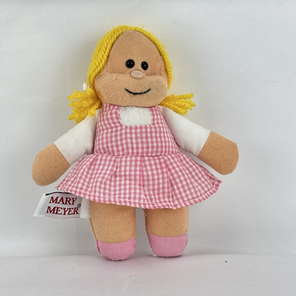 Mary Meyer 7-inch plush rag doll with yellow yarn pigtails and pink gingham dress