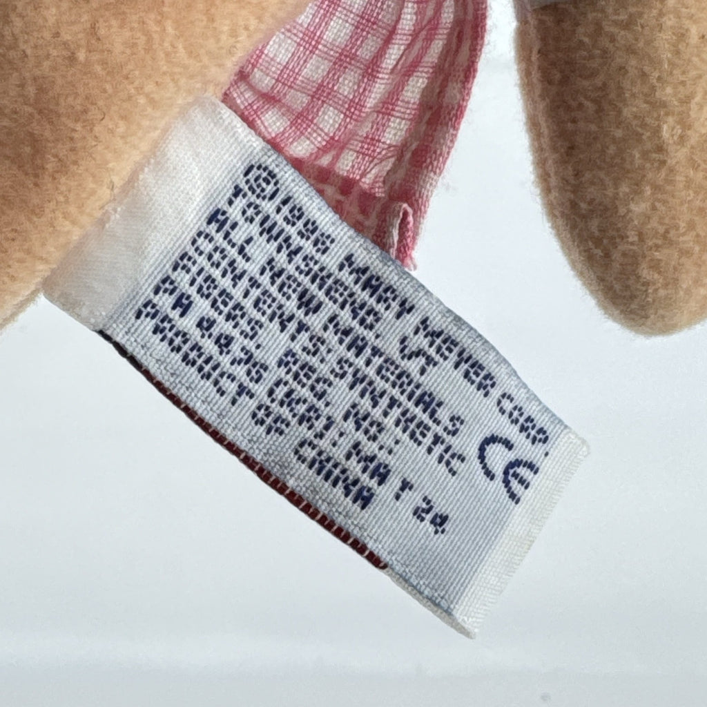 Mary Meyer 7-inch plush rag doll with yellow yarn pigtails and pink gingham dress