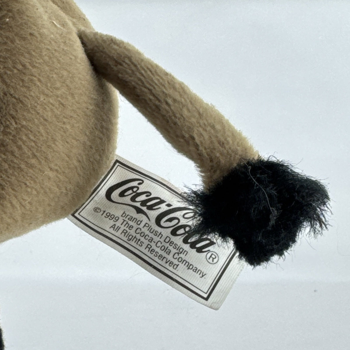 1999 Coca-Cola International collection brown Italy wild boar bean bag plush holding green contour bottle