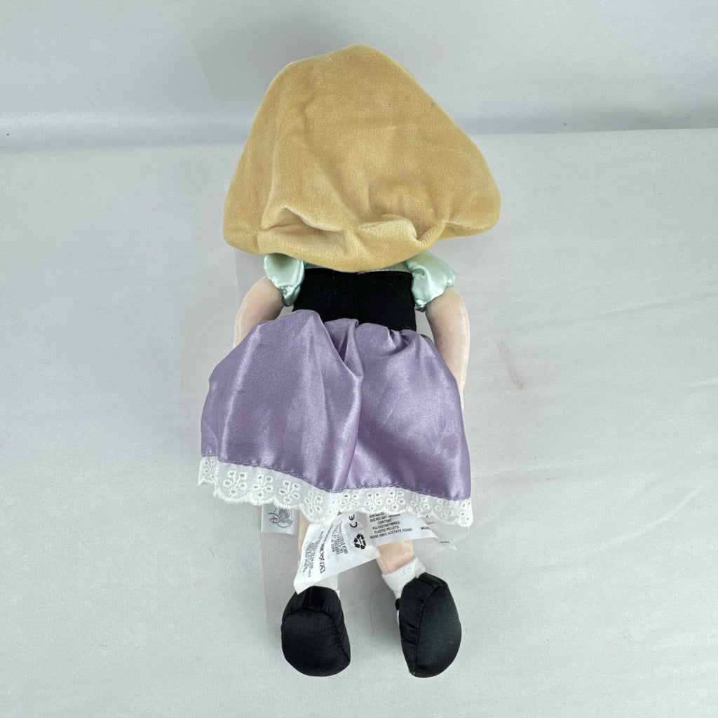 Disney Store Princess Aurora plush doll in Briar Rose peasant dress with lavender satin skirt