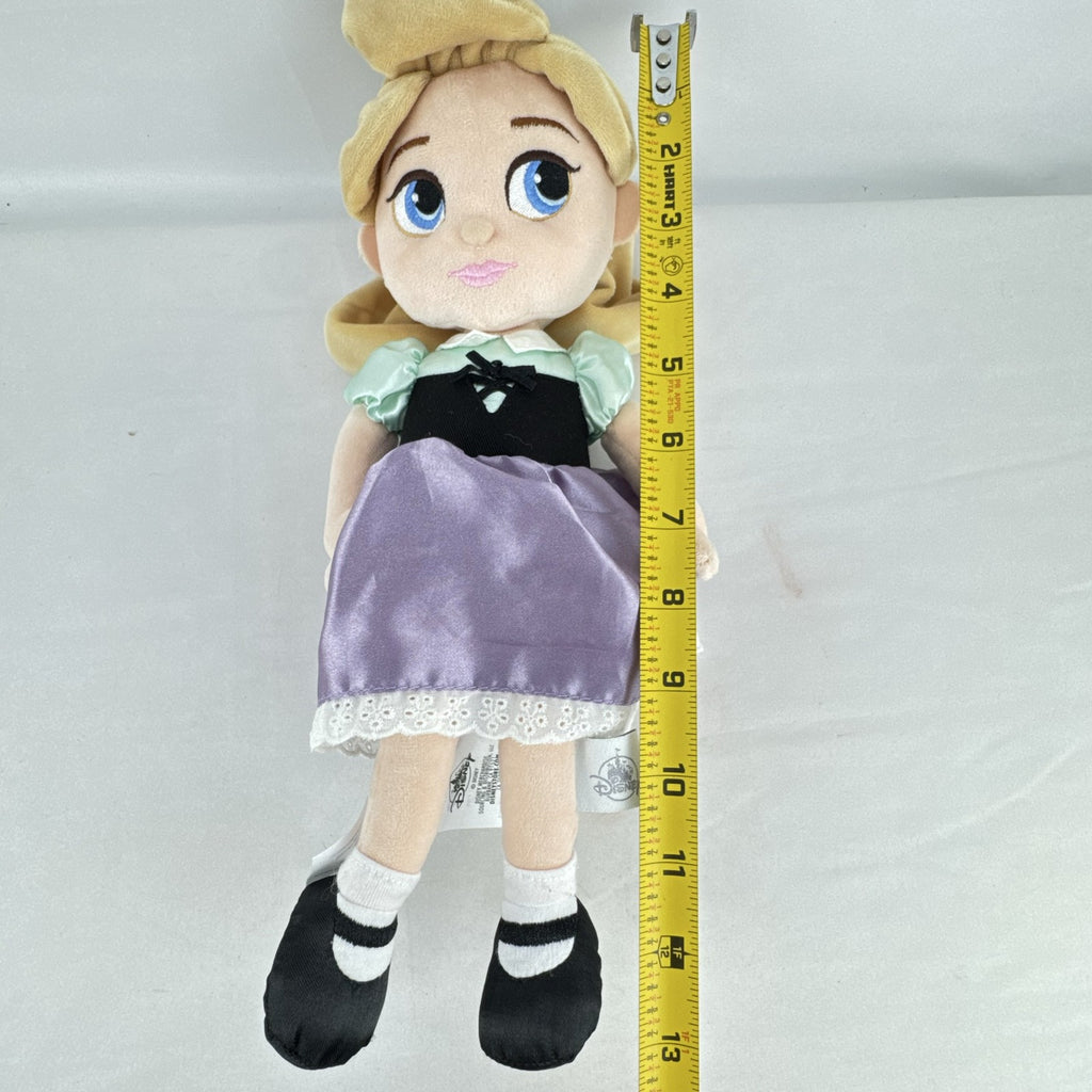Disney Store Princess Aurora plush doll in Briar Rose peasant dress with lavender satin skirt