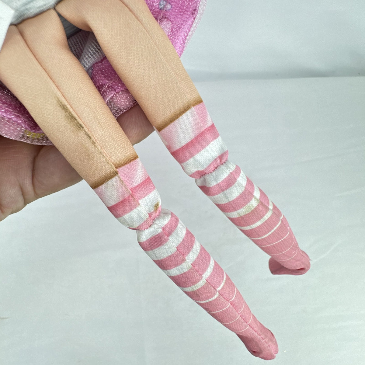 Moose Toys Dream Seekers Bella 14-inch rag doll with pink hair and tulle fairy wings