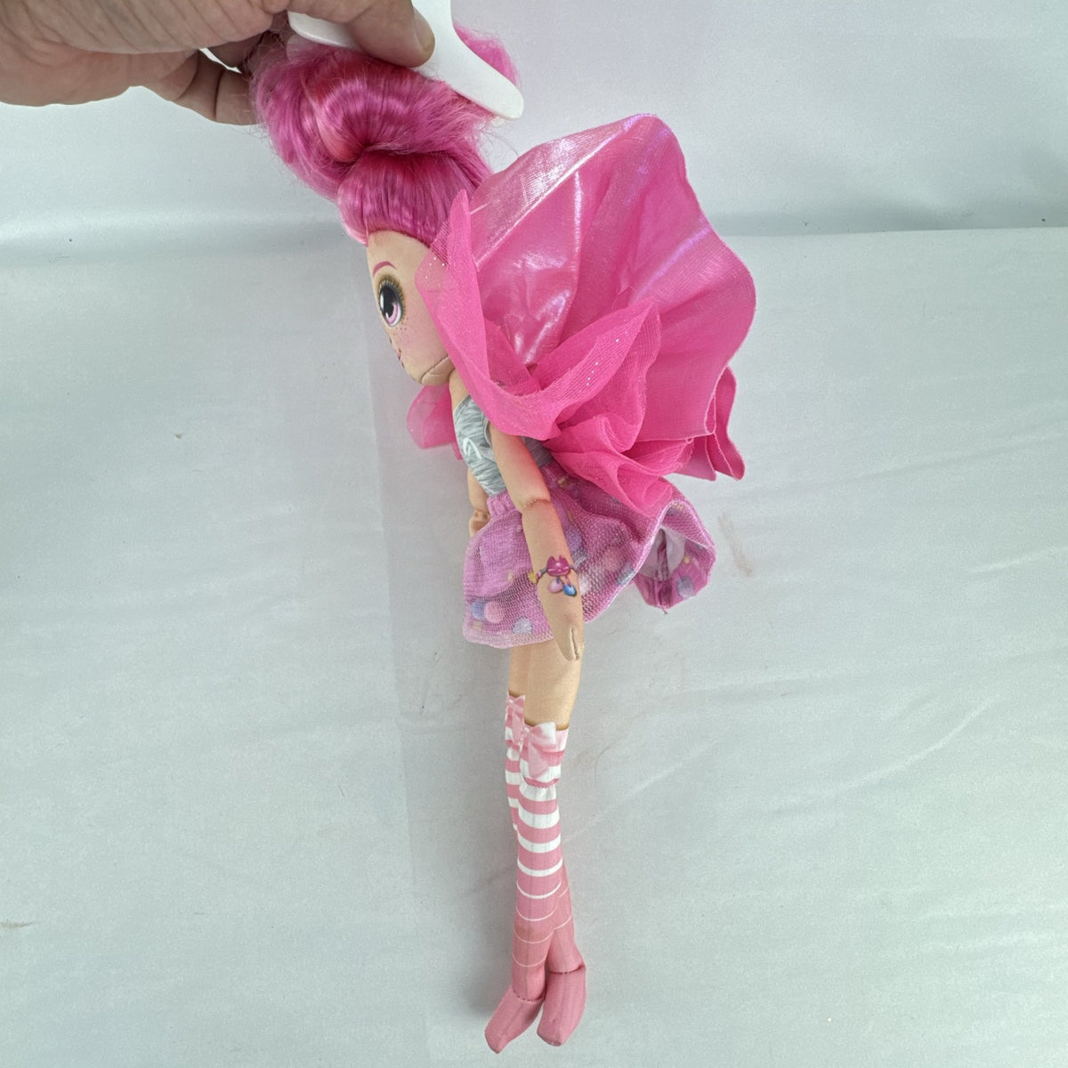 Moose Toys Dream Seekers Bella 14-inch rag doll with pink hair and tulle fairy wings