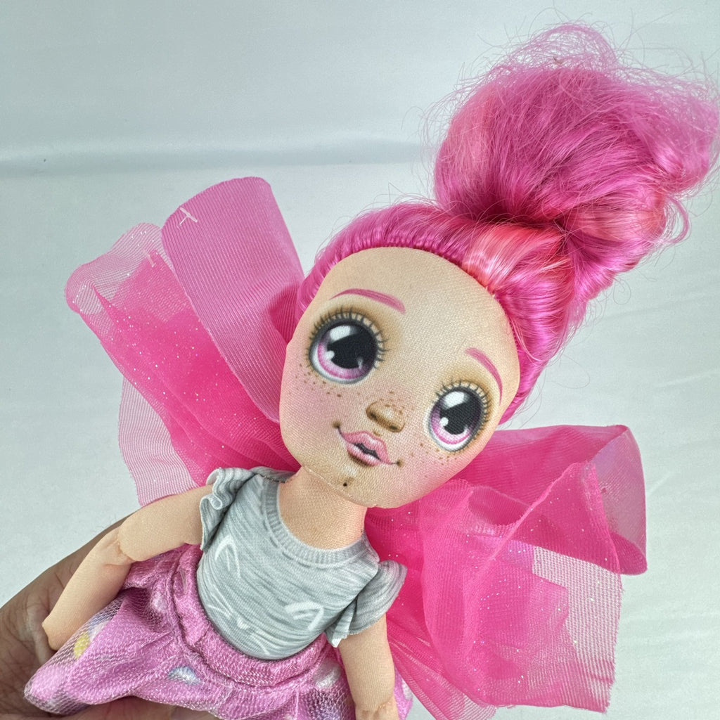 Moose Toys Dream Seekers Bella 14-inch rag doll with pink hair and tulle fairy wings