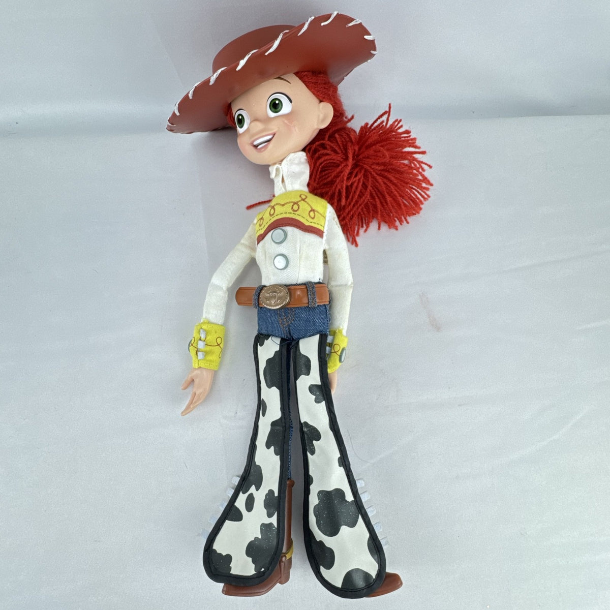 Disney Pixar Toy Story Jessie 15-inch cloth rag doll with red yarn hair and cowgirl hat