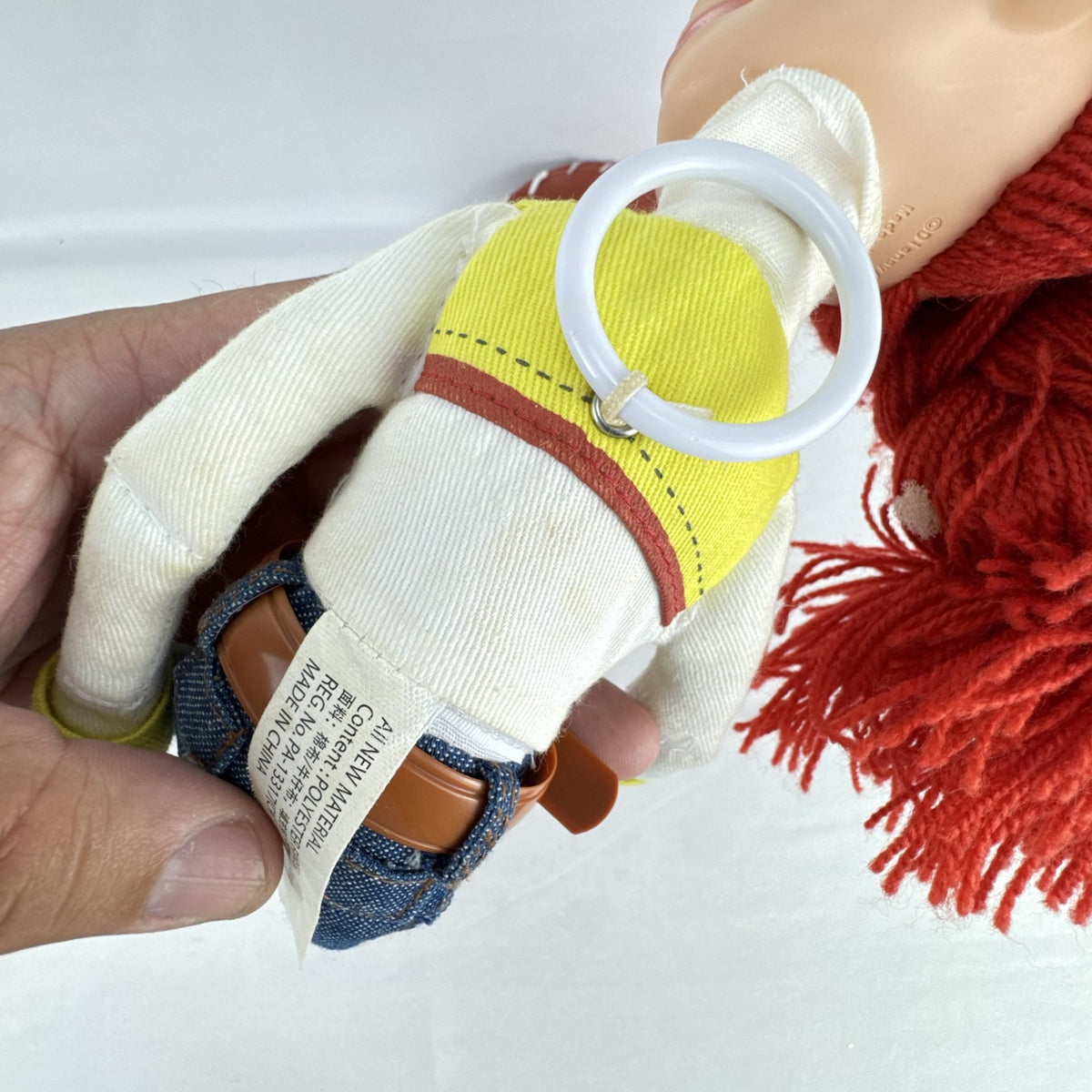 Disney Pixar Toy Story Jessie 15-inch cloth rag doll with red yarn hair and cowgirl hat