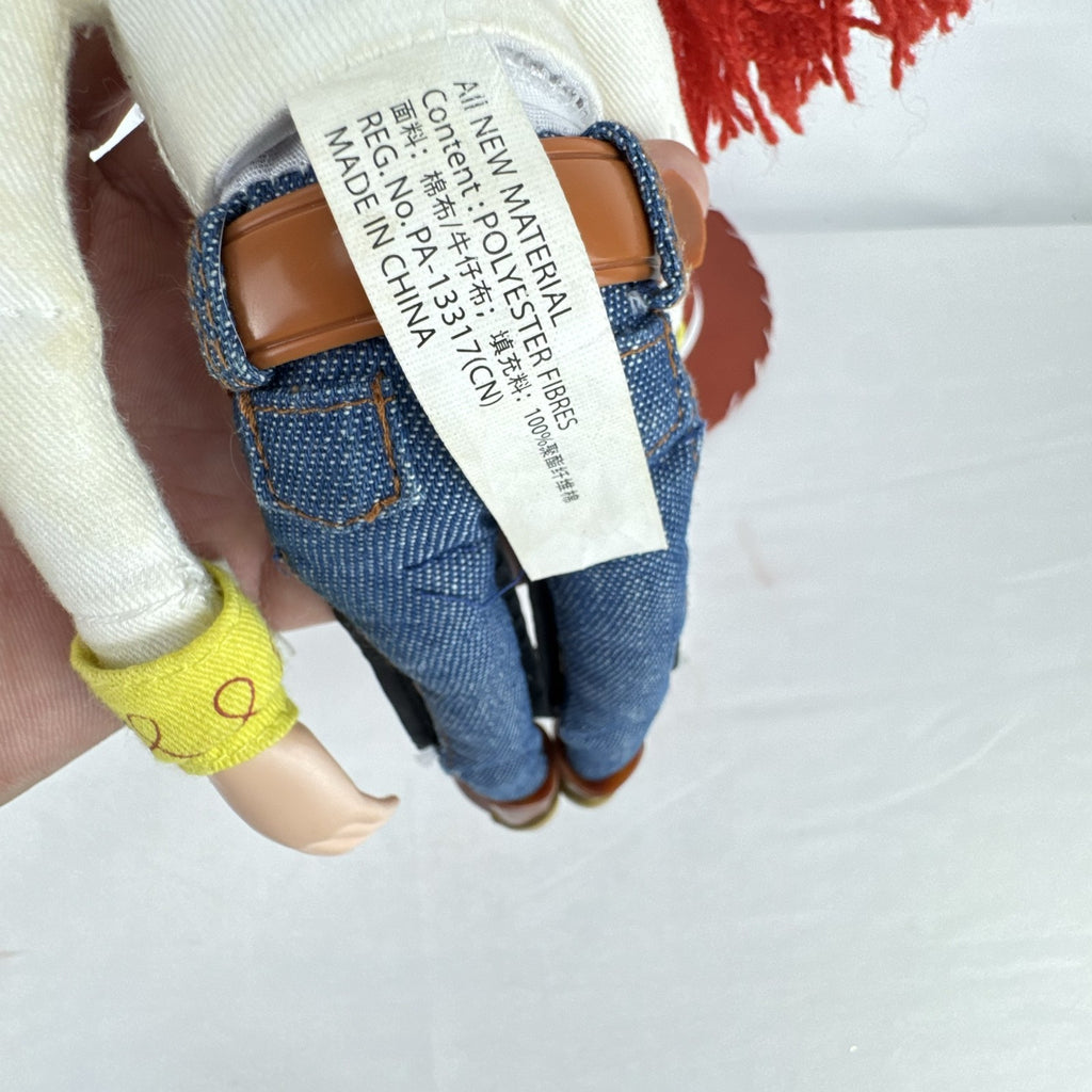 Disney Pixar Toy Story Jessie 15-inch cloth rag doll with red yarn hair and cowgirl hat