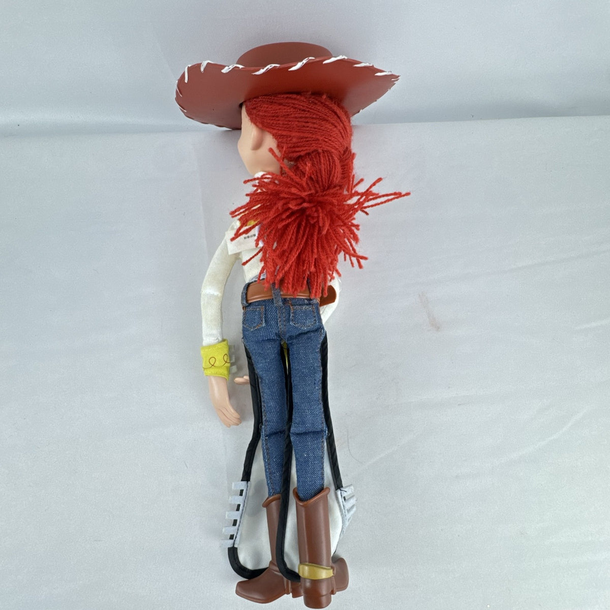 Disney Pixar Toy Story Jessie 15-inch cloth rag doll with red yarn hair and cowgirl hat
