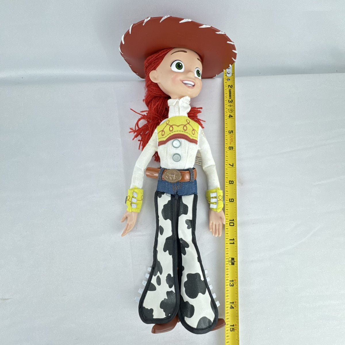 Disney Pixar Toy Story Jessie 15-inch cloth rag doll with red yarn hair and cowgirl hat