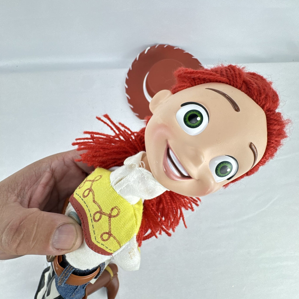Disney Pixar Toy Story Jessie 15-inch cloth rag doll with red yarn hair and cowgirl hat