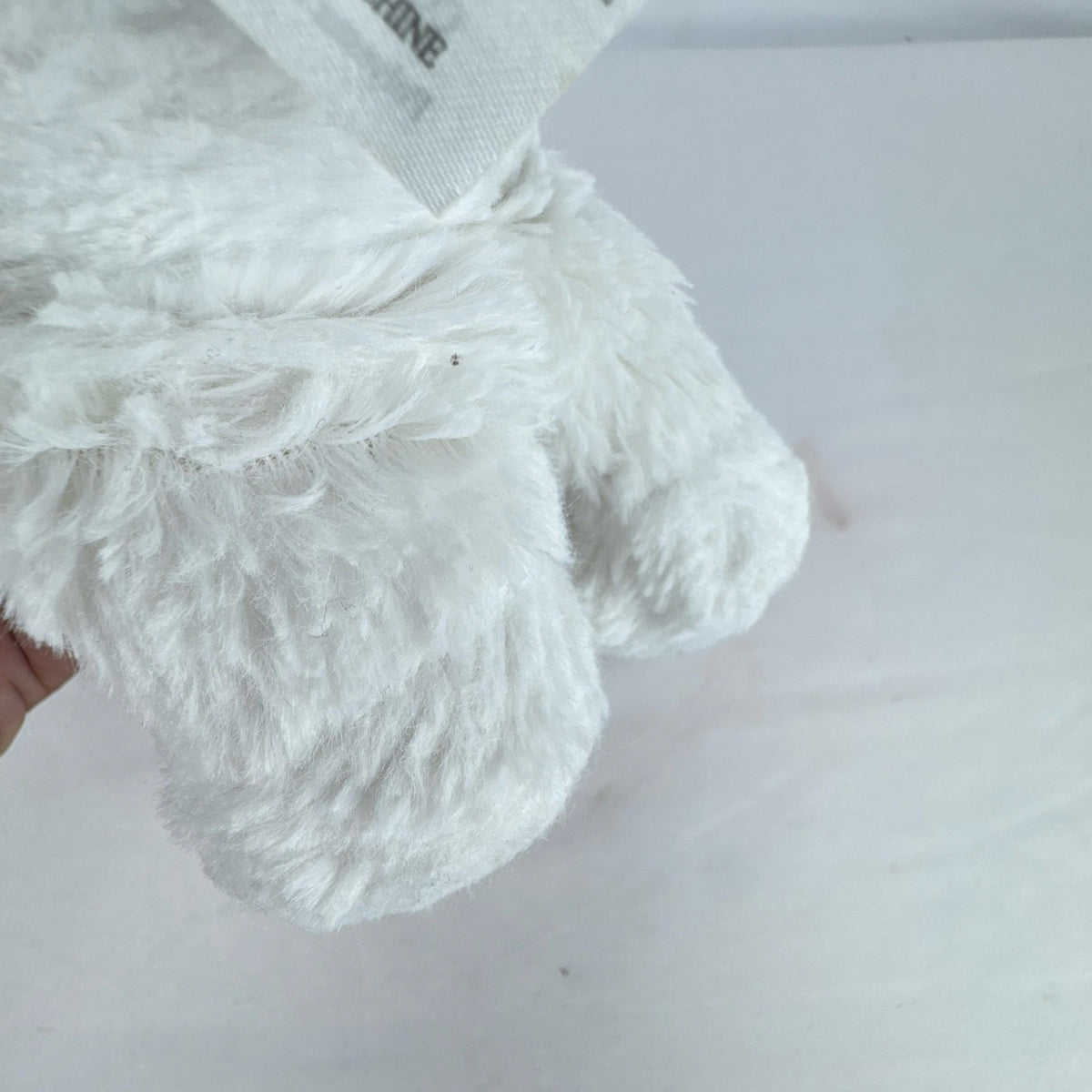 JAKKS Pacific Cabbage Patch Kids Cuties 9-inch Easter lamb plush doll in white fleece suit with chevron belly