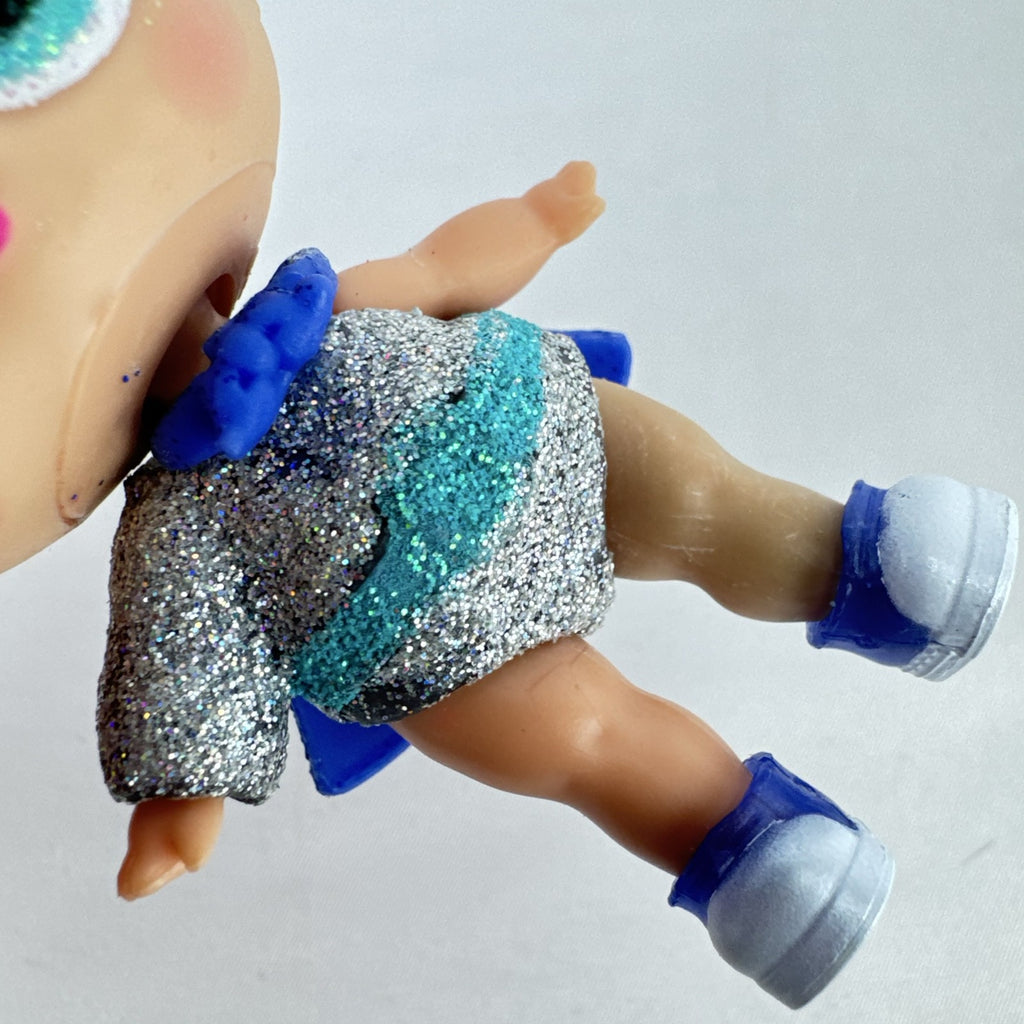 MGA Entertainment LOL Surprise Glitter Series Cosmic Queen 3-inch doll with pink glitter hair and cape