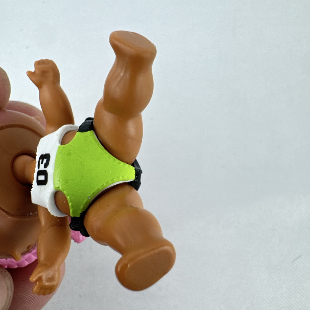 MGA L.O.L. Surprise Series 3 Confetti Pop Sprints doll in athletic outfit with pink braids
