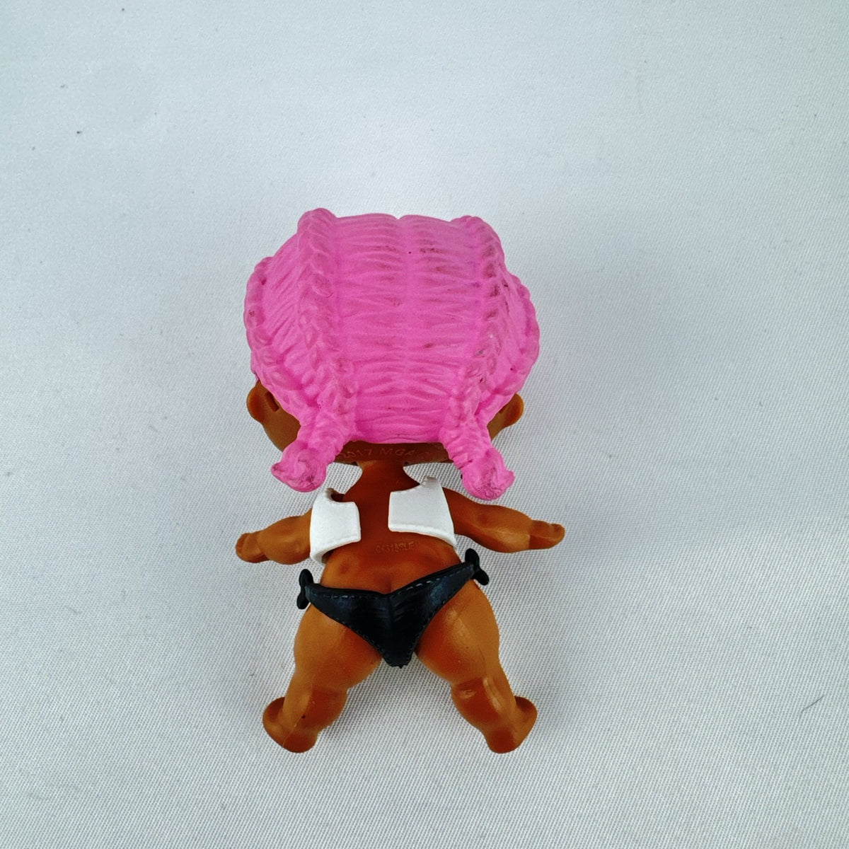 MGA L.O.L. Surprise Series 3 Confetti Pop Sprints doll in athletic outfit with pink braids
