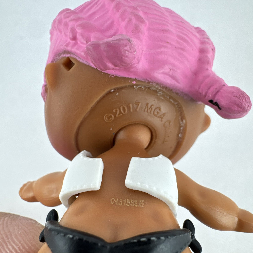 MGA L.O.L. Surprise Series 3 Confetti Pop Sprints doll in athletic outfit with pink braids