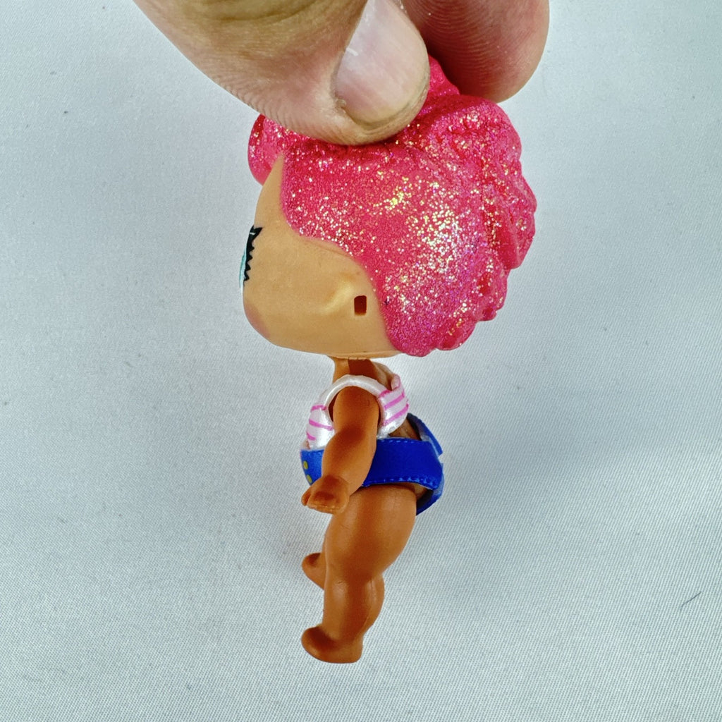 MGA L.O.L. Surprise High Dive doll with pink glitter hair and two-piece swimsuit