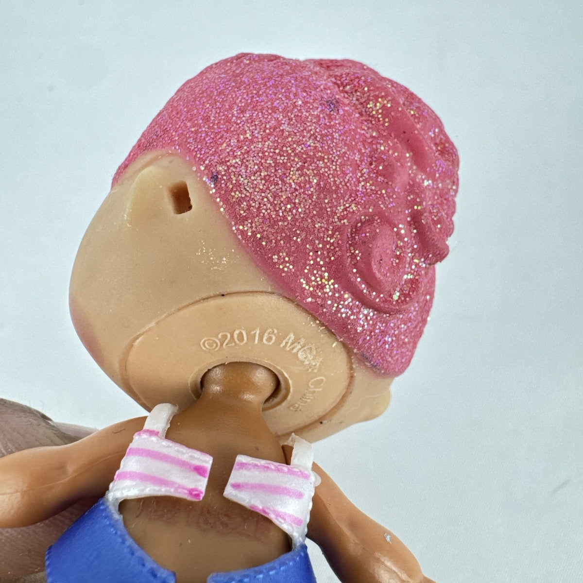 MGA L.O.L. Surprise High Dive doll with pink glitter hair and two-piece swimsuit