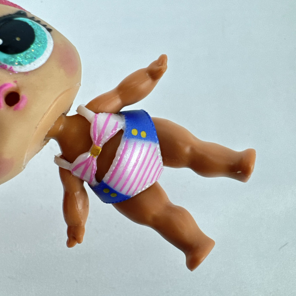MGA L.O.L. Surprise High Dive doll with pink glitter hair and two-piece swimsuit