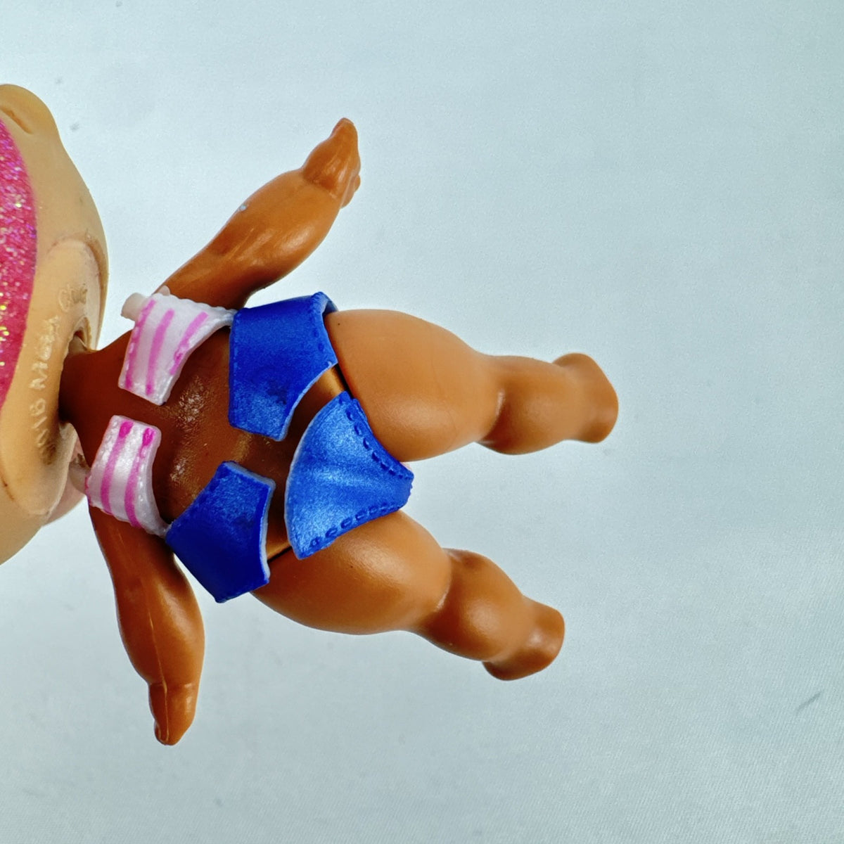MGA L.O.L. Surprise High Dive doll with pink glitter hair and two-piece swimsuit