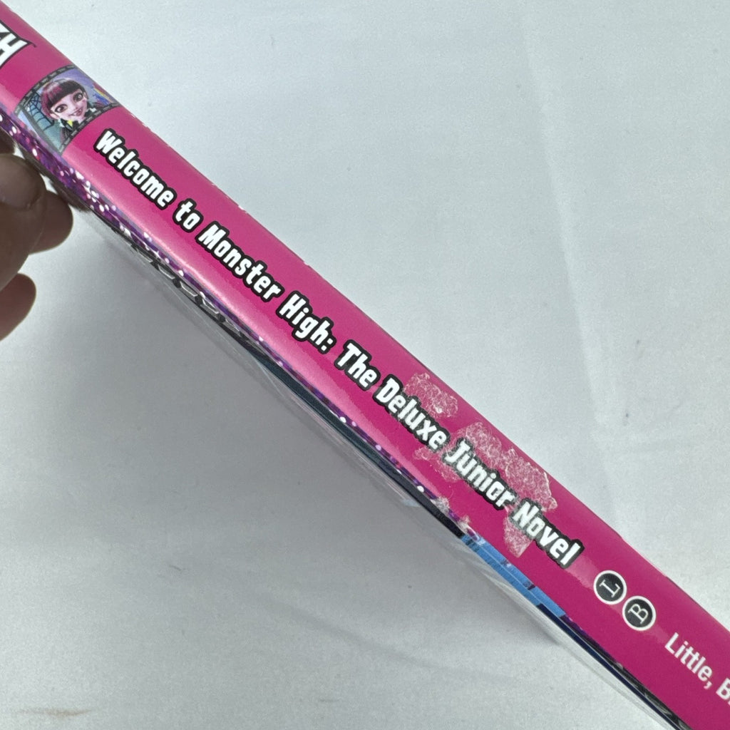 Mattel Monster High The Origin Story deluxe hardcover novel showing cover artwork and spine.