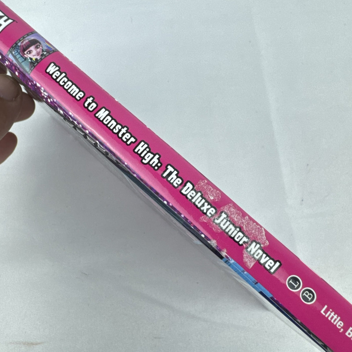 Mattel Monster High The Origin Story deluxe hardcover novel showing cover artwork and spine.