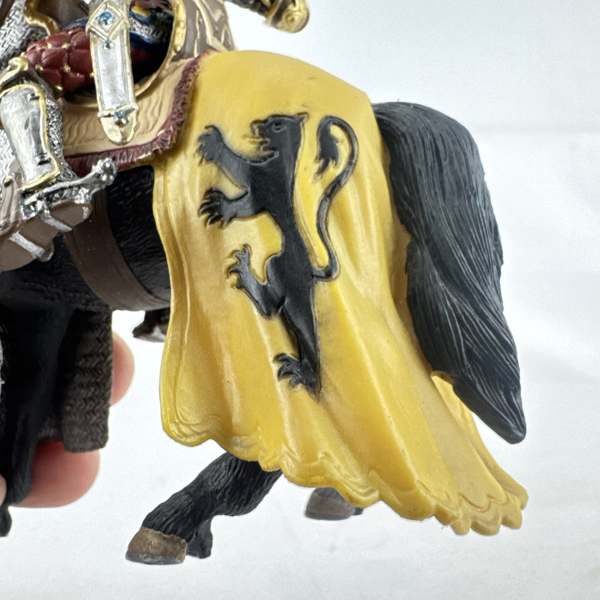 Schleich 2007 medieval knight figurine with sword and lion shield mounted on an armored warhorse