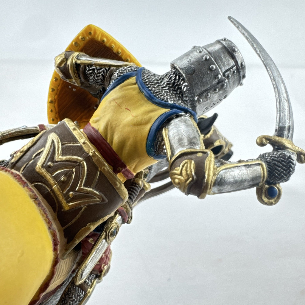 Schleich 2007 medieval knight figurine with sword and lion shield mounted on an armored warhorse