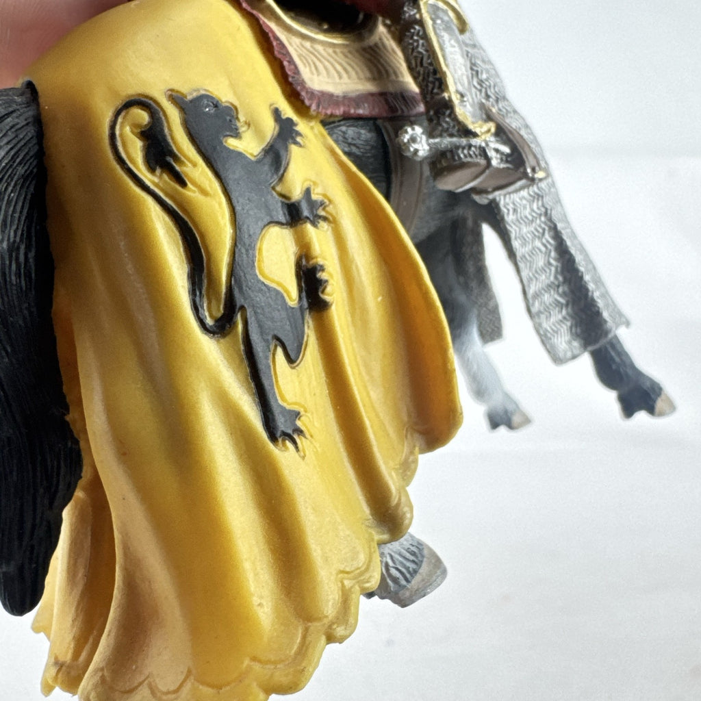 Schleich 2007 medieval knight figurine with sword and lion shield mounted on an armored warhorse