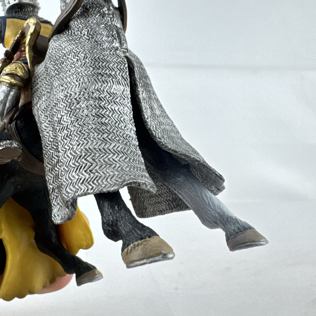 Schleich 2007 medieval knight figurine with sword and lion shield mounted on an armored warhorse
