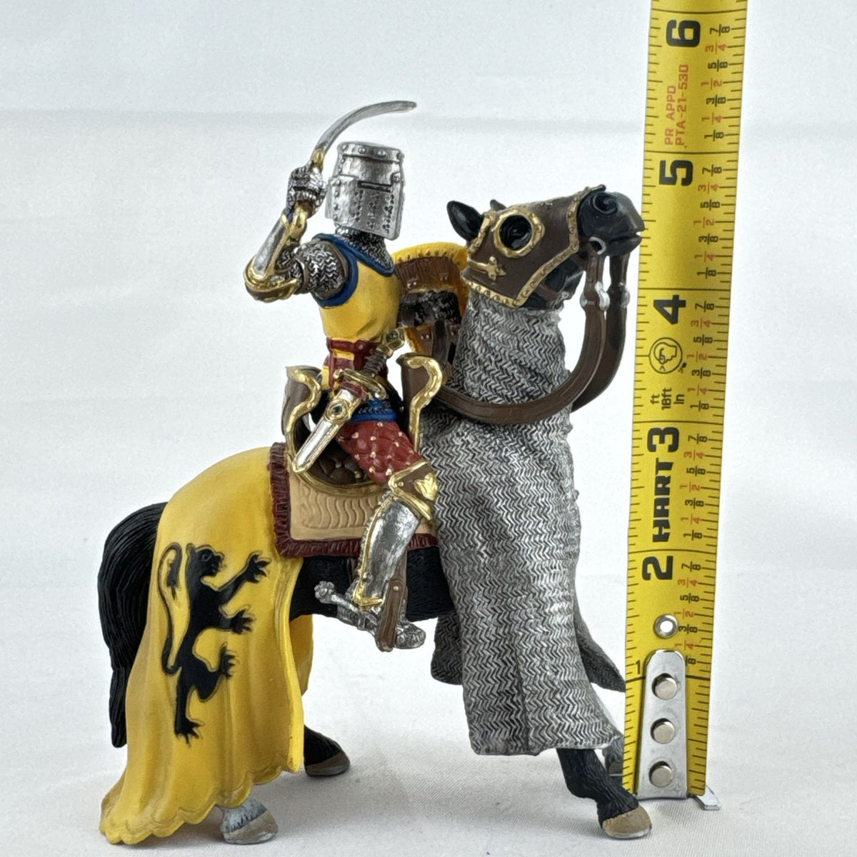 Schleich 2007 medieval knight figurine with sword and lion shield mounted on an armored warhorse