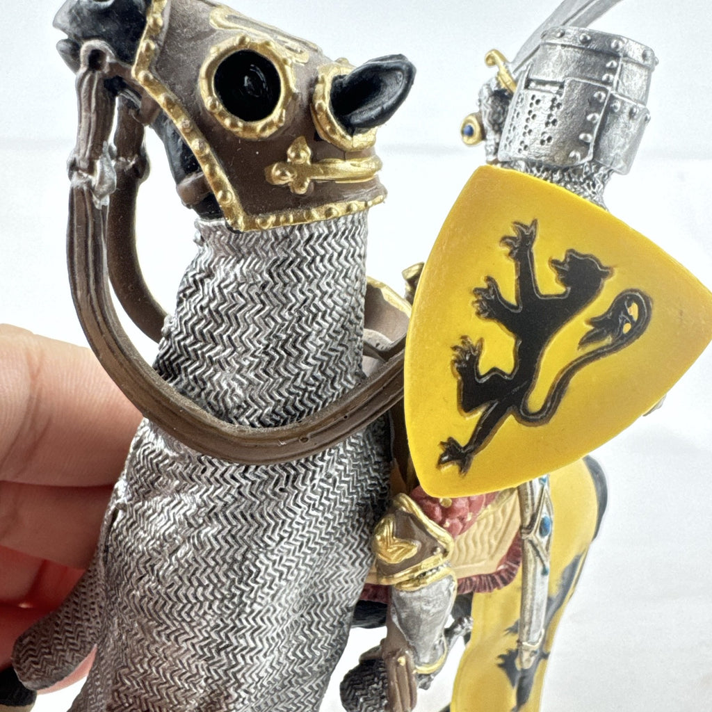 Schleich 2007 medieval knight figurine with sword and lion shield mounted on an armored warhorse