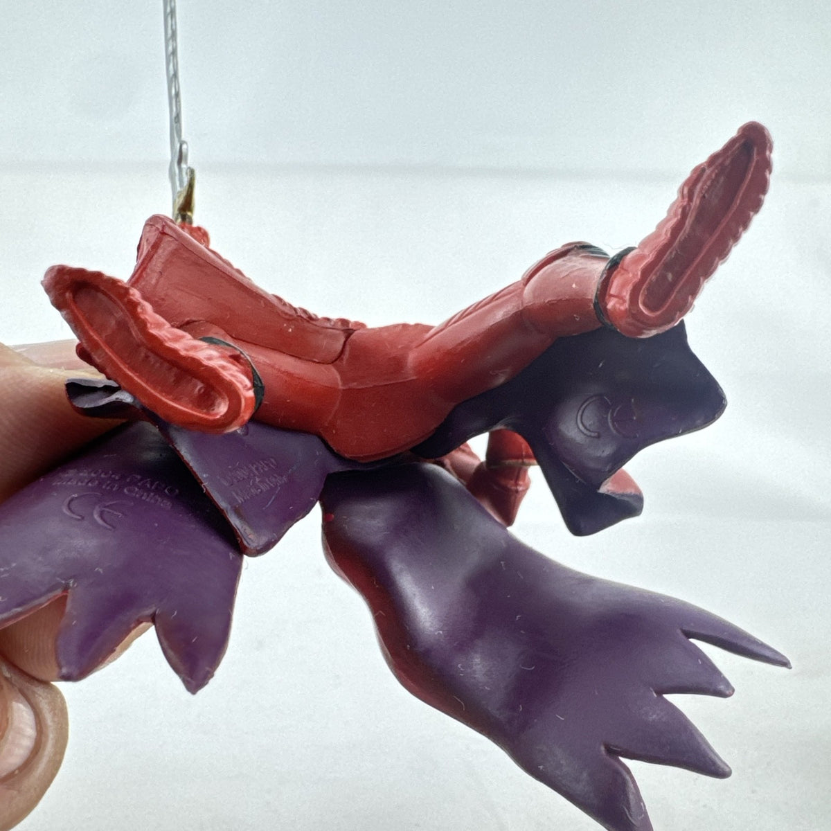 Papo red horned knight holding sword mounted on a Schleich crimson fleur-de-lis barded war horse