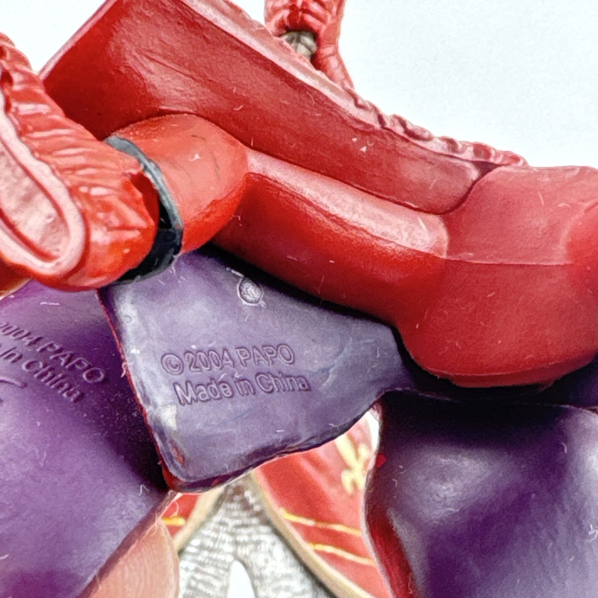 Papo red horned knight holding sword mounted on a Schleich crimson fleur-de-lis barded war horse