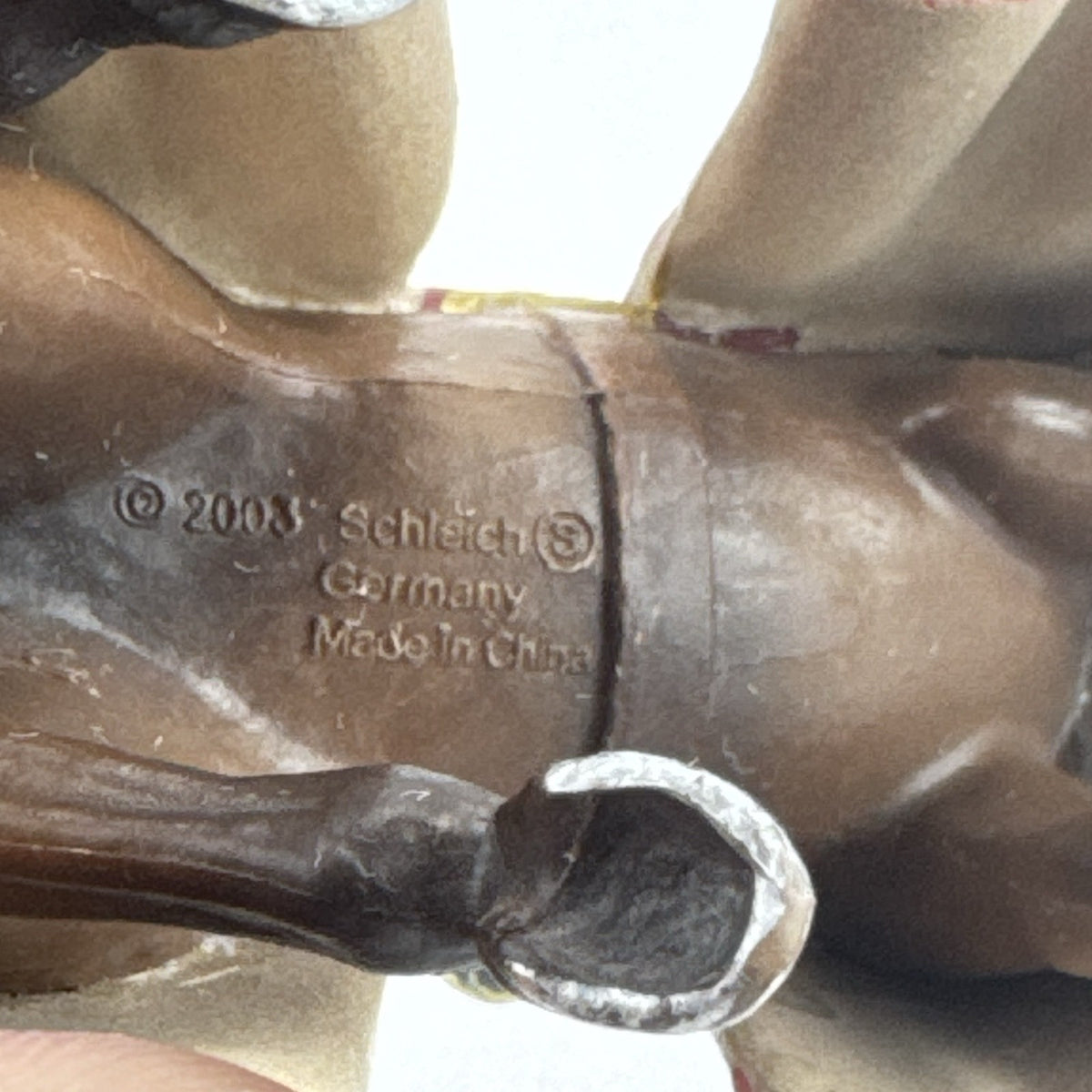 Papo red horned knight holding sword mounted on a Schleich crimson fleur-de-lis barded war horse