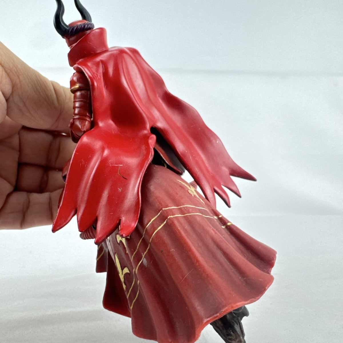 Papo red horned knight holding sword mounted on a Schleich crimson fleur-de-lis barded war horse