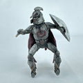 Schleich Eldrador Dragon Knight Rider action figure in plate armor with red cape and shield