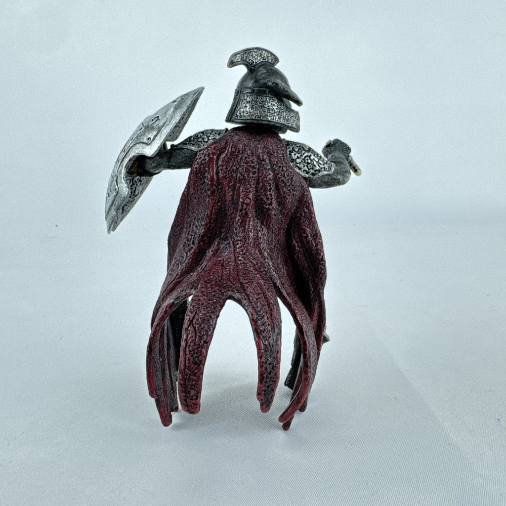 Schleich Eldrador Dragon Knight Rider action figure in plate armor with red cape and shield