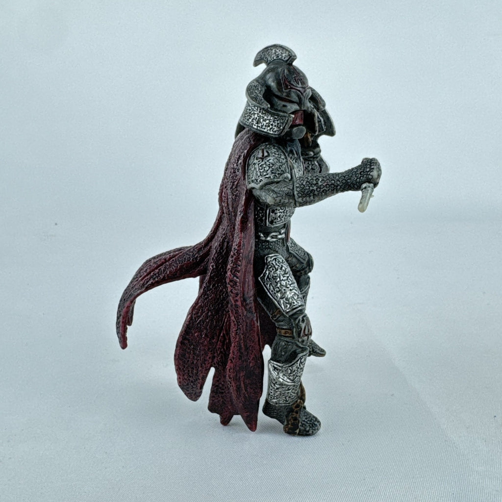 Schleich Eldrador Dragon Knight Rider action figure in plate armor with red cape and shield