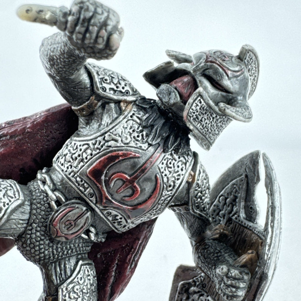 Schleich Eldrador Dragon Knight Rider action figure in plate armor with red cape and shield