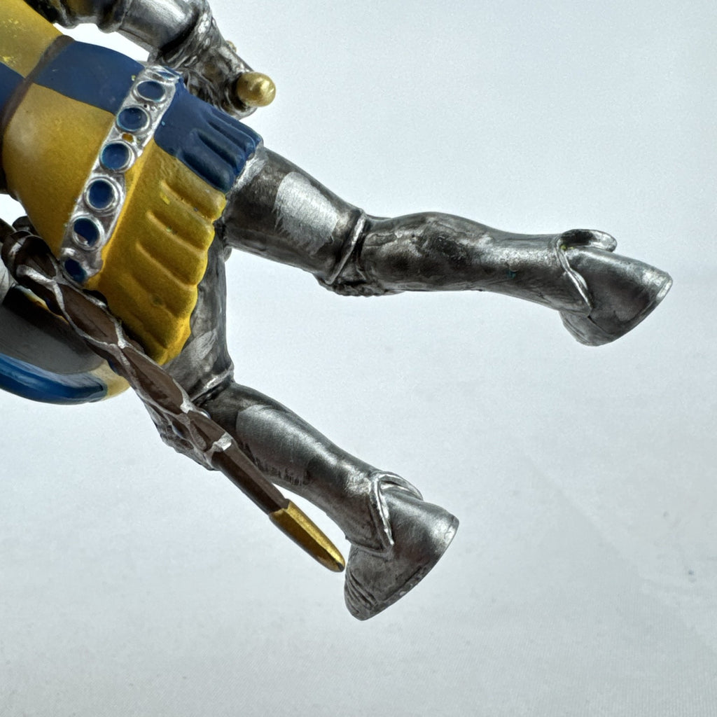Schleich 2003 medieval knight foot soldier plastic figure holding a sword and blue and yellow lion shield