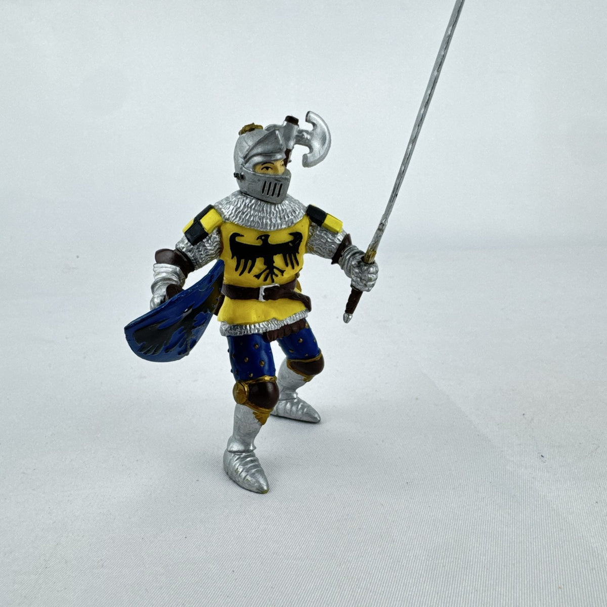 2002 Papo medieval knight action figure in yellow eagle armor with sword and shield