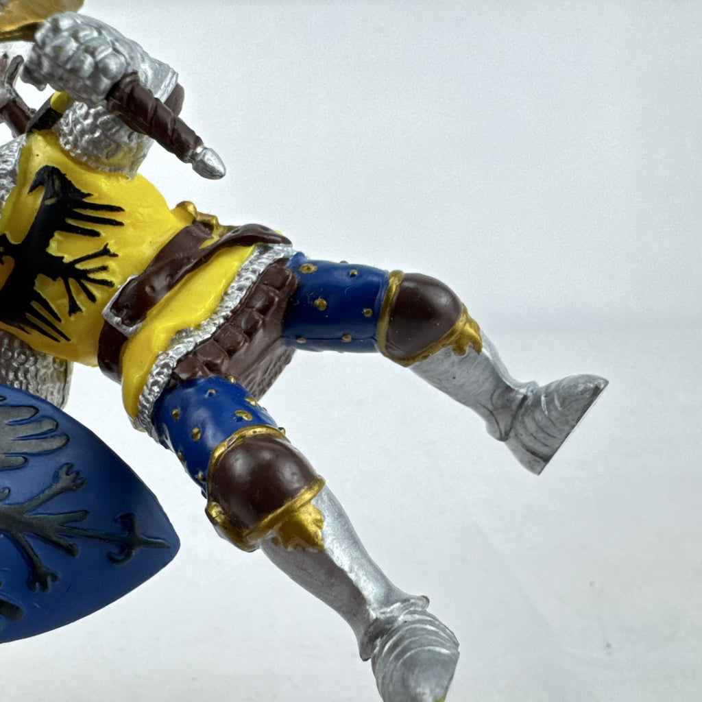 2002 Papo medieval knight action figure in yellow eagle armor with sword and shield