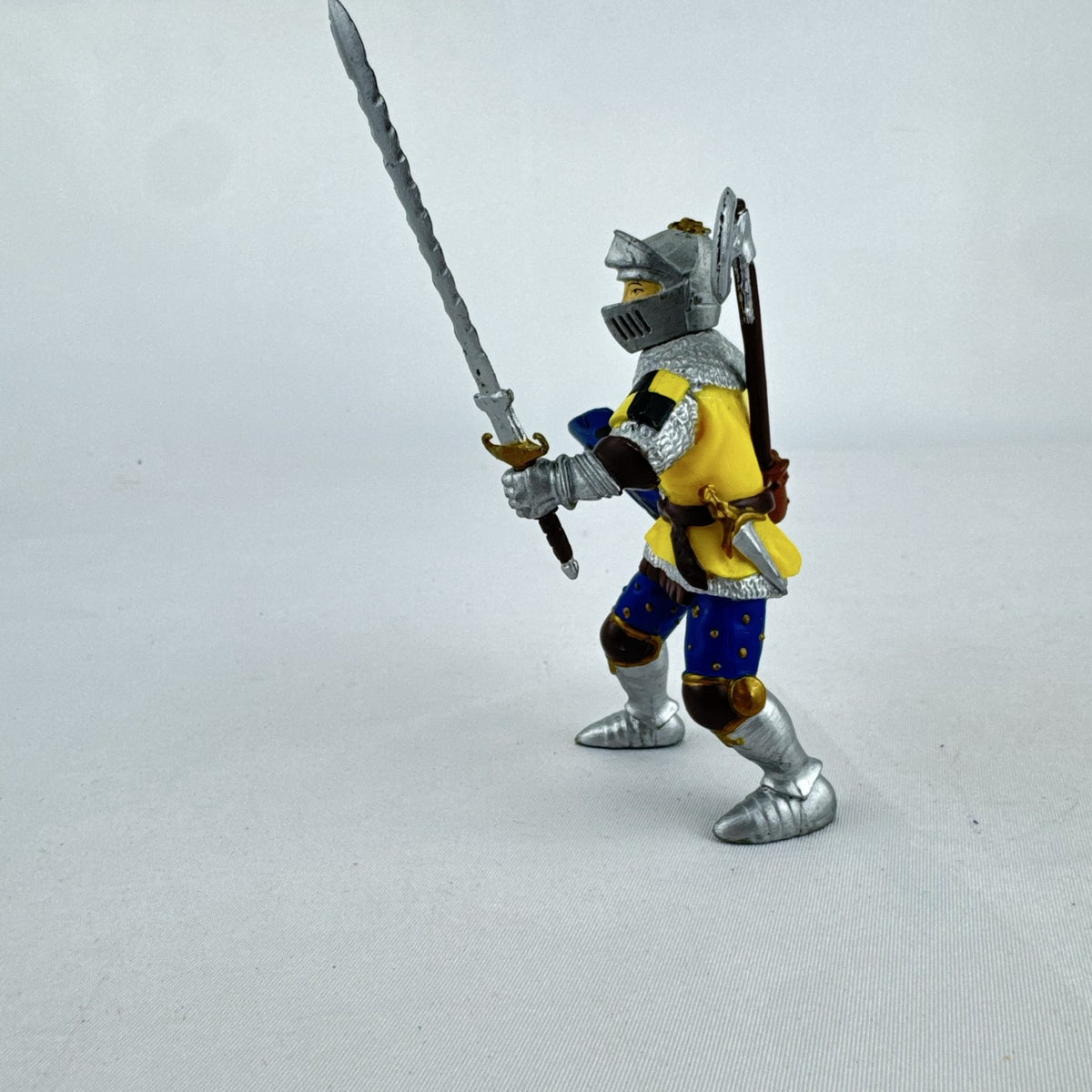 2002 Papo medieval knight action figure in yellow eagle armor with sword and shield