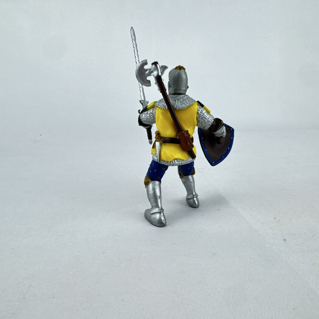 2002 Papo medieval knight action figure in yellow eagle armor with sword and shield