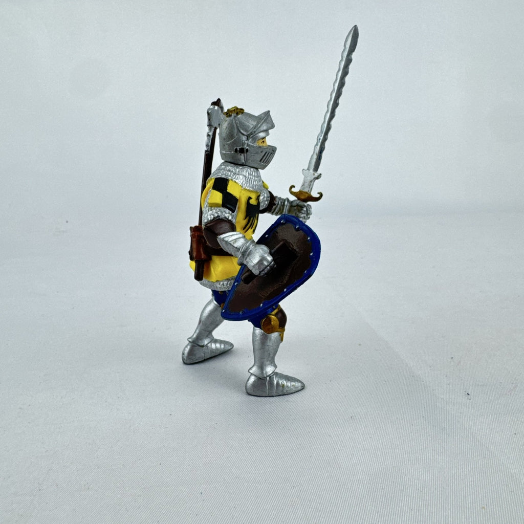 2002 Papo medieval knight action figure in yellow eagle armor with sword and shield