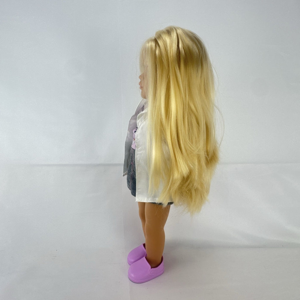 Our Generation Nicola 18-inch blonde veterinarian doll in white lab coat, patterned top, and purple shoes