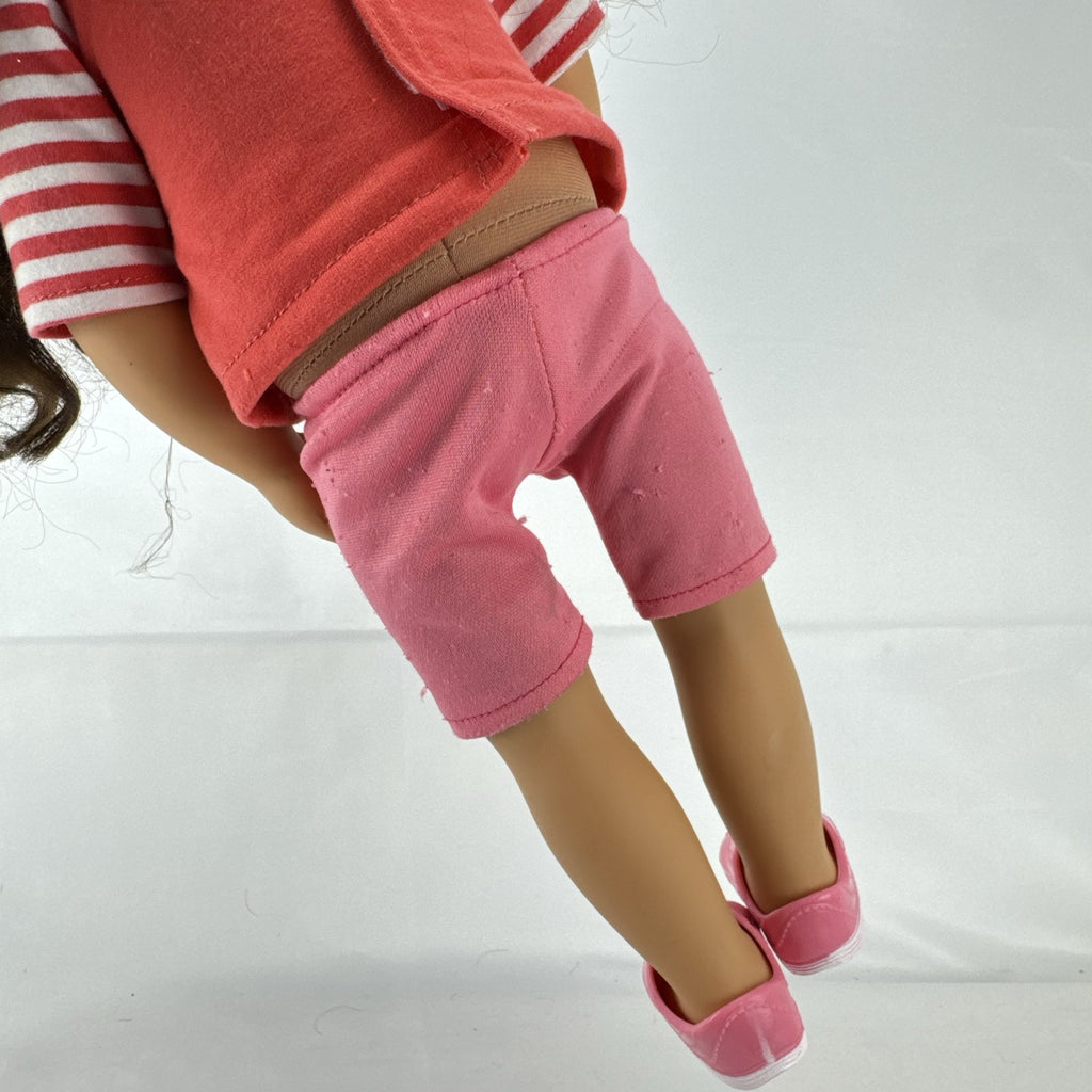 Battat Our Generation 18-inch doll with wavy brown hair, red striped shirt, and pink shorts